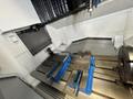 Okuma M560-V VMC, 2023 – 4th Axis, Probe, Chip Conveyor