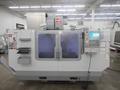 Haas VF-5/40 CNC Vertical Machining Center, 10K RPM, 24 ATC, Thru Spindle Coolant, Probing, 4th Axis Drive, 2 Speed Gearbox