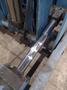 20,000 LBS BRANER HYDRAULIC COIL UPENDER WITH POWER FEED CONVEYOR: YOBRO #25238