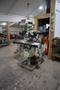 Trionics Handyman Vertical Knee Mill, Variable Speed, Accurite 2 Axis DRO, Power Table Feed- Auction Item