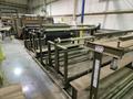 100 TON ATOM S 6110 / 2 L EV DIE CUTTING PRESS W/ UNWIND STATION. STOCK # 0772526