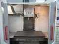 Haas VF-2 CNC Vertical Machining Center with 15,000 RPM CT-40 Spindle, High Speed Machining, Side Mount Tool Changer, 4th Axis Ready, Macros, and Chip Auger.