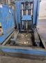 20,000 LBS BRANER HYDRAULIC COIL UPENDER WITH POWER FEED CONVEYOR: YOBRO #25238