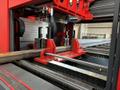 Akyapak 3ADM 1200 3-Spindle 10-Axis CNC Drilling Line, 2025 – 51″ x 23″ AST1300 Double Miter Bandsaw, Chip Conveyor, Transfer Tables