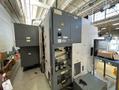Okuma Macturn 350-W Multi-Axis CNC Lathe, 2004 – Chip Conveyor