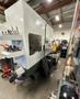 Haas EC-500 Horizontal Machining Center 2014 equipped with Haas CNC Control, CT40 Spindle, 70 Station Automatic Tool Changer, 4th Axis, Probing, Tomb Stones, TSC, Remote Hand Jog, Chip Conveyor, Coolant Pump