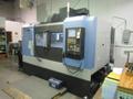 Doosan Mynx 6500/40 CNC Vertical Machining Center with Doosan-Fanuc i Series CNC Control,  30-ATC Thru Spindle Coolant, 12,000 RPM, CAT 40,- Auction Item