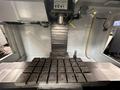 HAAS VM-2 CNC Vertical Machining Center 2011 equipped with quipped with 30"x20"x20" Travels, Haas Control, 4th Axis Drive, 24 ATC Side Mount Tool Changer, Tool Pre-Setter, Cool, Chip Auger