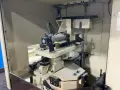 MAKINO MILLING MACHINE CO., LTD. 18”X32” TABLE CNC VERTICAL MACHINING CENTER  -  SNC64-A5