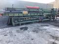 20&#039; SUTTON POWERED INFEED &amp; OUTFEED CONVEYORS / RACKS: STOCK #16743
