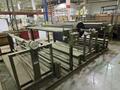 100 TON ATOM S 6110 / 2 L EV DIE CUTTING PRESS W/ UNWIND STATION. STOCK # 0772526