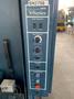 LANTECH V-SERIES DUAL TURNTABLE PALLET WRAPPER. STOCK # 0895024.