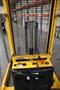 Uline H-5439 Electric Straddle Stacker Lift, 2,200# Cap, 63" Max Height, 50" Between Outriggers, 12 Volt Battery with Charger, 42" Forks- Auction Item