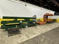 SWEED LOAD CLAMP &amp; TURNER / PACMAN FLIPPER SYSTEM WITH POWERED INFEED &amp; OUTFEED CONVEYORS: STOCK #22075