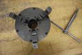 Buck 8.25" 3-Jaw Chuck, D1-4" Camlock Back, 2" Hole, Chuck Wrench- Auction Item