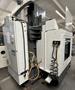 HAAS VM-2 CNC Vertical Machining Center 2011 equipped with quipped with 30"x20"x20" Travels, Haas Control, 4th Axis Drive, 24 ATC Side Mount Tool Changer, Tool Pre-Setter, Cool, Chip Auger