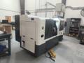 Hwacheon Hi-Tech 200A CNC Lathe, 2009 – Fanuc Oi-TC Control, Mist Buster, Chip Conveyor and Tailstock