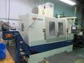 Daewoo DMV-5025 CNC Vertical Machining Center with Fanuc 21i-MB, 24 ATC, 12K RPM, Thru Spindle Coolant, Chip Conveyor- Auction Item