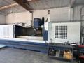 Takumi V32 VMC, 2007 – 4th Axis, CAT50, Box Way, TSC, Chip Conveyor
