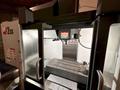 2024 HAAS VF-2SS with HC10 6-Axis Cobot with low hours. Vertical Machining Center