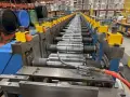 30 STAND X 1.5" RLM (NEW 2001) ROLLFORMER LINE TOOLED FOR LEAF SOLUTIONS GUTTER TOPPER, 20" ROLL SPACE STOCK# 4412