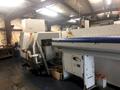 Traub TNL26 CNC Swiss Lathe, 2009 – Bar Feeder, Available Immediately