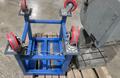 TAUMEL ORBITAL RIVETER WITH STAND DAMAGED USED
