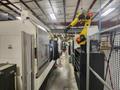 Okuma Genos M460V-5AX 5-Axis CNC VMC, 2021 – Robot Loader, Chip Conveyor, Mist Collector