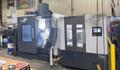 Doosan DVF 5000 5-Axis VMC, 2022 – 18K Spindle, 120 ATC, Through Spindle Coolant/Air, 8 Pallet Changer, Probing, Mist Collector, Conveyor