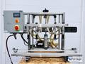 Liquid Packaging Solutions Model: 310-150  ||  Semi-Automatic Table Top Overflow Filler