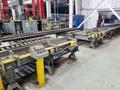 LEWCO POWERED ROLLER ENTRY &amp; EXIT CONVEYOR SYSTEM. STOCK #0522323.