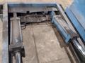 20,000 LBS BRANER HYDRAULIC COIL UPENDER WITH POWER FEED CONVEYOR: YOBRO #25238