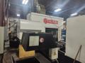 Huron NX40 Double Column Bridge Gantry Machining Center, 2013 – J30 High Pressure Through Spindle Coolant System, Chip Conveyor, Tooling, Siemens Sinumerik Control