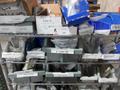 Rolling Wire Shelf with Contents of Assorted Hardware and Fasteners- Auction Item