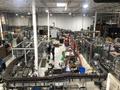 Krones Kosme 150 BPM Complete Bottling Line, 2014 – 28-Valve Filler, 7-Head Capper, Labeler, Depalletizer &amp; Case Packer
