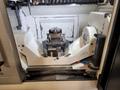 Okuma Genos M460V-5AX 5-Axis CNC VMC, 2021 – Robot Loader, Chip Conveyor, Mist Collector