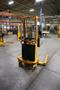 Uline H-5439 Electric Straddle Stacker Lift, 2,200# Cap, 63" Max Height, 50" Between Outriggers, 12 Volt Battery with Charger, 42" Forks- Auction Item