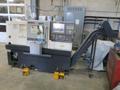 Okuma Genos L250E CNC Turning Center, OSP-P300L/R CNC Control, 8&quot; Chuck, Tool Setter, Parts Catcher, 12-Station Turret, Tailstock, Chip Conveyor