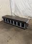 25" WIDE X 89" LONG X 24.5" TALL T-SLOTTED TABLE. STOCK # 0778825