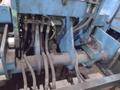 20,000 LBS BRANER HYDRAULIC COIL UPENDER WITH POWER FEED CONVEYOR: YOBRO #25238