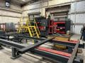 Akyapak 3ADM 1200 3-Spindle 10-Axis CNC Drilling Line, 2025 – 51″ x 23″ AST1300 Double Miter Bandsaw, Chip Conveyor, Transfer Tables