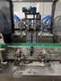 Liquid Filling Line with Automatic 4 Nozzle Servo Gear Pump Filler, Lid Presser, Labeler, Turntables, and Conveyors, 2024