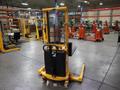 Uline H-5439 Electric Straddle Stacker Lift, 2,200# Cap, 63" Max Height, 50" Between Outriggers, 12 Volt Battery with Charger, 42" Forks- Auction Item
