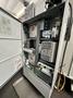 HAAS VM-2 CNC Vertical Machining Center 2011 equipped with quipped with 30"x20"x20" Travels, Haas Control, 4th Axis Drive, 24 ATC Side Mount Tool Changer, Tool Pre-Setter, Cool, Chip Auger