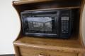 Amana Turntable Microwave with Wooden Hutch- Auction Item