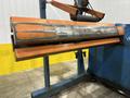 12,000 LB X 72" ROWE MODEL #12060-DSV POWERED COIL REEL / UNCOILER WITH HOLD DOWN ARM: STOCK 20234