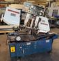 Birmingham HL-250 Equipped with: Vari Speed Blade Drive Hydraulic Vise, Hydraulic Shuttle Vise Chip Auger, Built- In Coolant Pan and Pump Manual/Auto Operation, Multiple Stroke Counter Presently Wired 220/3/60, Hydraulic Vise Hold-down Attachment (Removable)