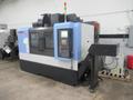 Doosan DNM 500 CNC Vertical Machining Center, 12K RPM Spindle, High Pressure Coolant, Renishaw Probing, Full 4th Axis, Chip Conveyor