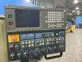 MAKINO MILLING MACHINE CO., LTD. 18”X32” TABLE CNC VERTICAL MACHINING CENTER  -  SNC64-A5