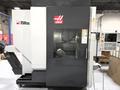 Haas UMC-750SS 5-Axis 2018 with: 5th Axis, 12k RPM Spindle, Through Spindle Coolant, 40 ATC,  Probing, Chip Conveyor, and Coolant Tank.